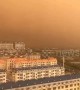 Sky turns orange in Chinese town after cold winds carry dust in air