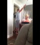 Canadian woman screams and jumps out chair after spider prank