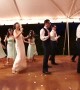 Wedding party joins bride and groom for epic first dance