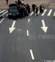Good Samaritans lift car up to rescue trapped scooter rider in China