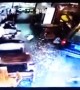 Mother and son escape injury after a car smashes into a restaurant in China