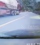 Heroic car driver jumps into driverless lorry to stop it from sliding down Chinese highway