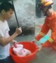Firefighters rescue residents trapped by floods in China's Guangdong