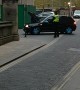 Delivery Driver Stuck to Safety Bollard