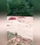 Flash floods sweep vehicles away in China after heavy rainstorm