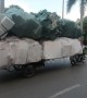 Ridiculously overloaded motorcycle cart carries 6m stack of foam boxes