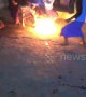 Barefoot teens in Indonesia play football with FIREBALLS