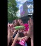 Singer Kate Nash crowd surfs on top of fans at London Mighty Hoopla festival