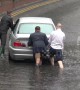 Kind men help stranded motorist during flooding in West London
