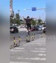 Daredevil unicyclist balances on roadside guardrails in China