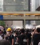 Police fire tear gas from above as protesters gather in Hong Kong