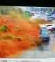 Terrifying moment massive landslide wipes out parked vehicles in China