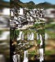 Amazing drone footage showcases China’s ancient town built around waterfall