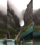Mysterious scene shows clouds flowing through a mountain passage in China's Hunan