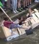 Students at UK’s elite Cambridge University celebrate end of exams with annual alcohol-fuelled cardboard boat race