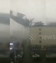 Roof ripped off by strong wind crashes onto parked vehicles below in northern China