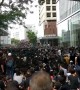 Sea of protesters block roads outside Hong Kong police headquarters