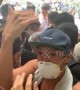 Old man quarrels with protesters inside Hong Kong's Immigration Tower