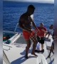 A man fails miserably attempting to jump off a yacht