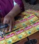 Sewing plastic waste into bags and aprons in Indonesia