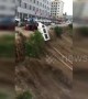 Flash floods in China's Yanhe sweep parked vehicles into Wu River after rainstorm