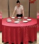 Hotel employee in China shows off incredible table setting skills