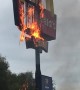 Fast Food Sign on Fire