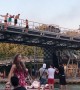 Parisians dive into canal to stay cool during heatwave