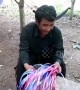 Cambodian father who couldn't afford to buy new rucksack for his son weaves one by hand from blue string
