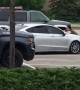 Gutsy Woman Tries to Stop Fleeing Car