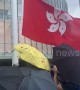 Hong Kong protesters raise black flag in front of Legislative Council