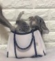 Just an incredibly cute chinchilla in a handbag