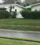 Man Won't Let Rain Ruin His Mowing