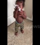 Cute baby imitates someone blowing their nose