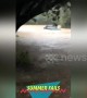 Pick-up truck fails to avoid torrential Washington DC-area flooding and gets totally submerged