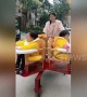 Homemade spinning pushchair designed for triplets spotted in China's Zhuhai
