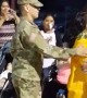 Soldier surprises sister at her graduation ceremony