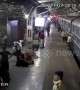 Commuters rush to save woman from being run over by train in western India