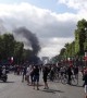 French riot police use tear gas to disperse Bastille Day protesters