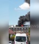 Thick smoke envelops London block of flats in east Acton