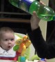 Baby\'s mind gets totally blown while watching mom drink