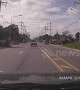 Truck in Thailand tries to cut off other drivers but immediately flips over and crashes
