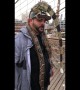 NYC man has an IGUANA for a hat and a SNAKE for a scarf