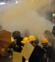 Hong Kong police fire tear gas as protesters approach police lines