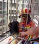 Firefighters rescue girl hanging from fourth-floor window in China's Ganzhou