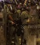 Closeup footage shows Hong Kong riot police firing tear gas towards protesters