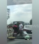 Shocking moment Filipino driver pokes motorcyclist in the eye and knocks him off before speeding away