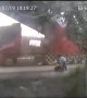 Truck trailer narrowly misses man after smashing into bridge in China