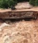 Shocking moment motorcyclists plunge into rapid floodwater after makeshift bridge collapses in Cambodia