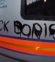 Police cars vandalised as they hold out against anti-Boris Johnson protest in London